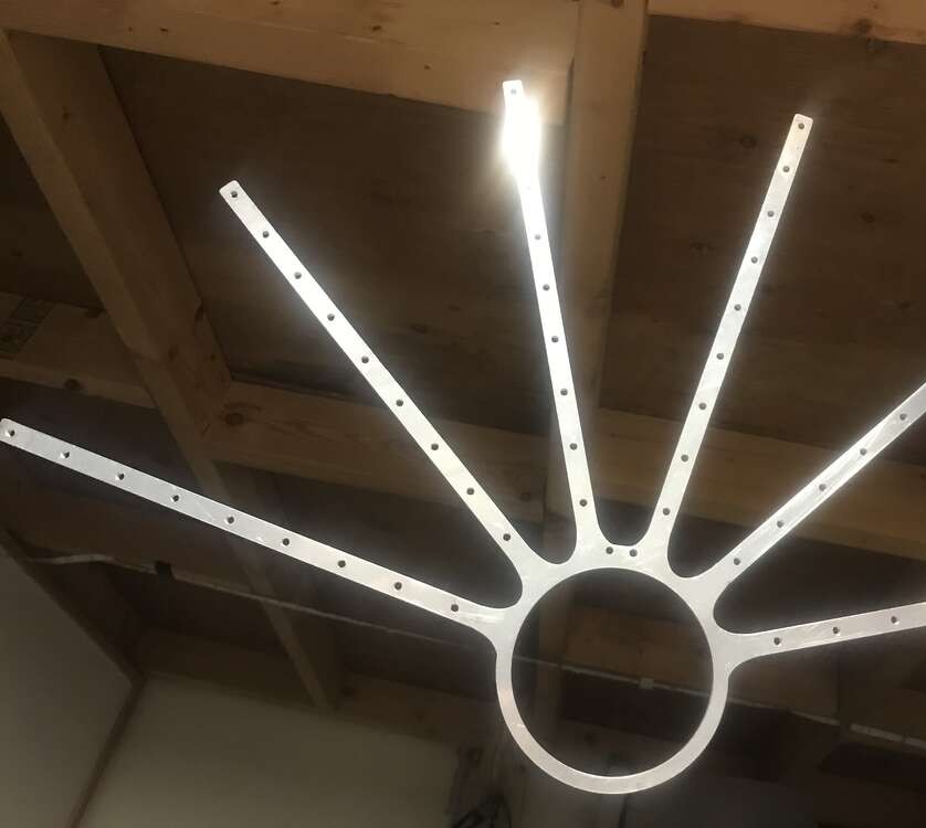 PyroFox's all metal fan frame prototype glinting in the light