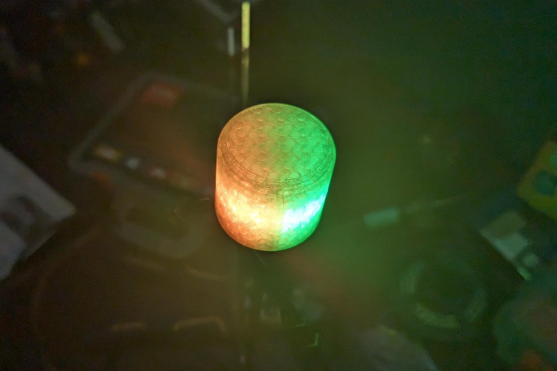 Prototype led wick lit orange and green